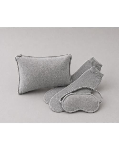 Travel in unparalleled comfort and style with this luxurious cashmere travel set. Luxury